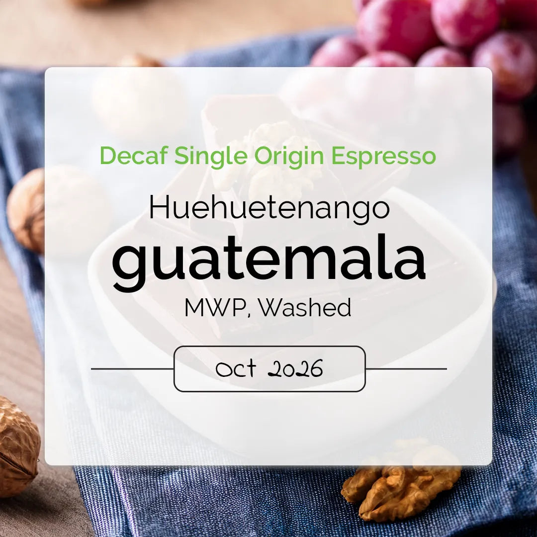 Mountain Water Decaf from Huehuetenango Guatemala with flavors of milk chocolate, walnut and concord grape.